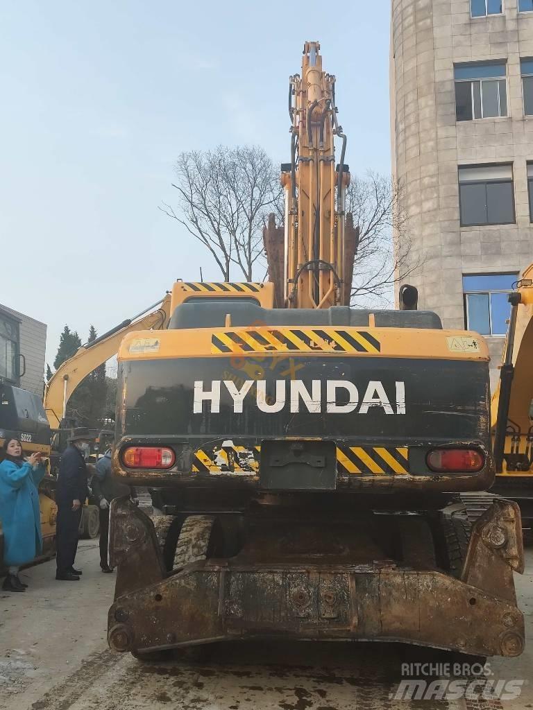 Hyundai 210W-9 حفارات بعجل