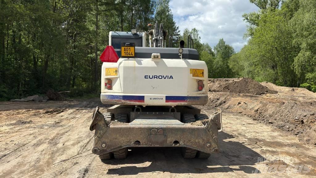 Komatsu PW 148-8 حفارات بعجل