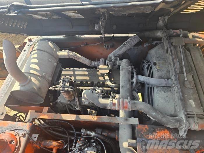 Doosan DX 210 W حفارات بعجل
