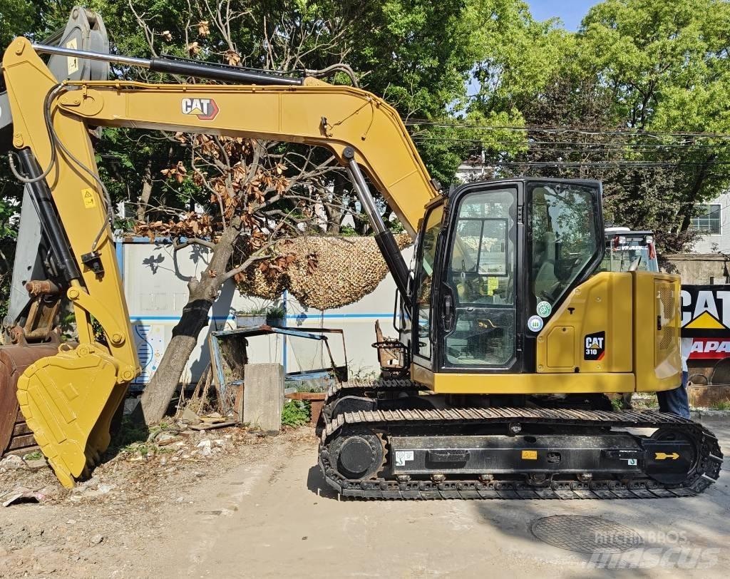 CAT 310 حفارات زحافة