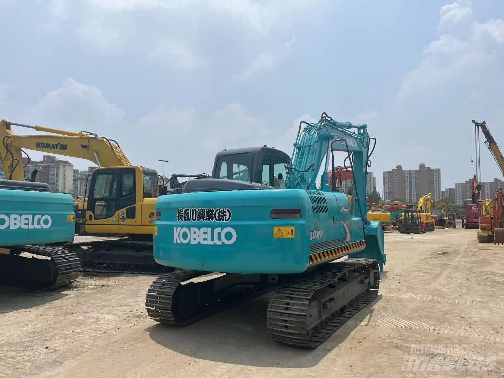 Kobelco sk140 حفارات زحافة