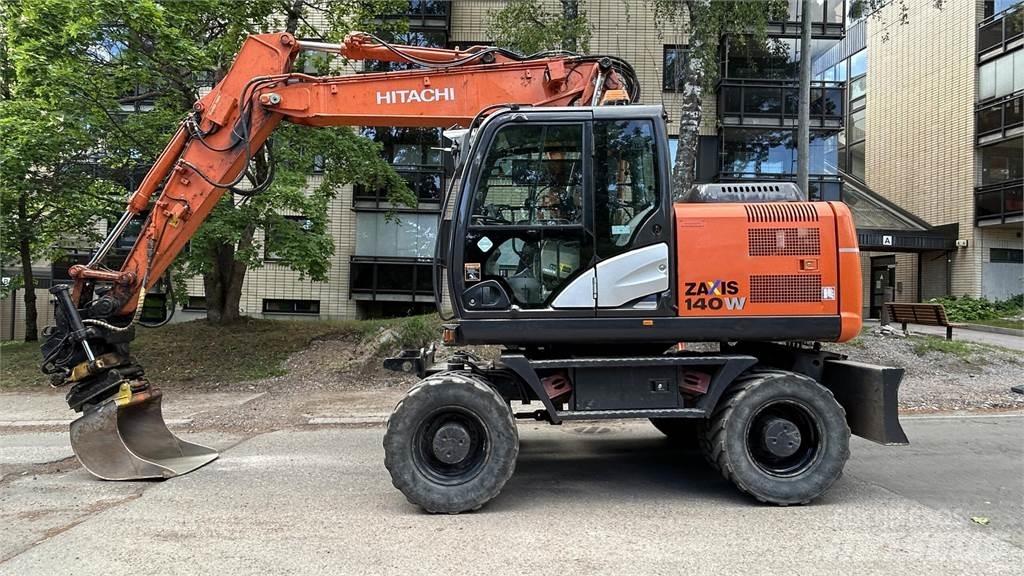 Hitachi ZX140W-5B حفارات بعجل