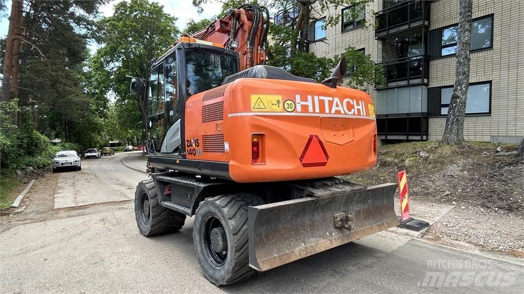 Hitachi ZX140W-5B حفارات بعجل