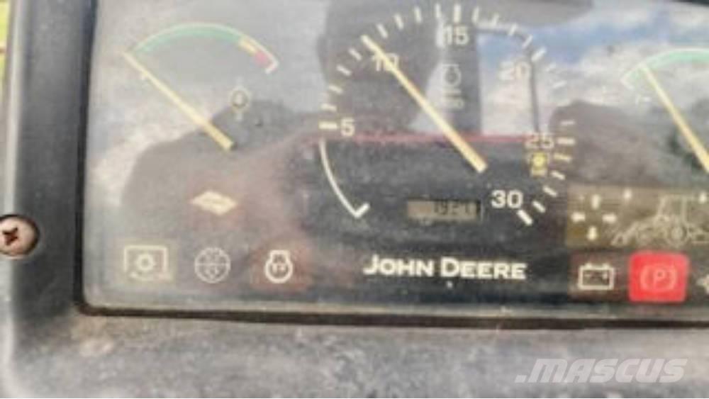 John Deere 110 لوادر ذات جرافات عكسية