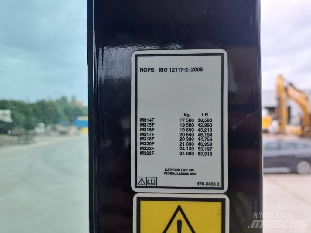 CAT M315F حفارات بعجل