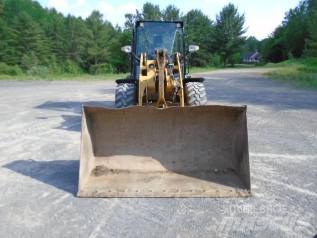 CAT 906 H 2 لوادر بعجل