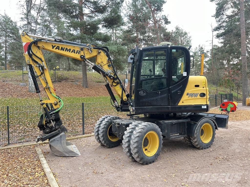 Yanmar B75W حفارات بعجل