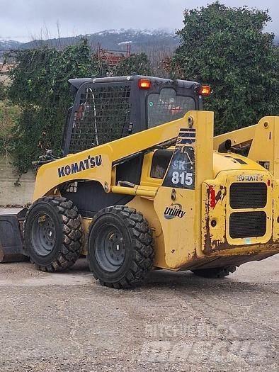 Komatsu SK815 لوادر صغيرة