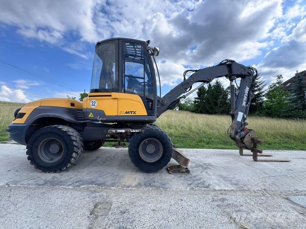 Mecalac 12 MTX حفارات بعجل