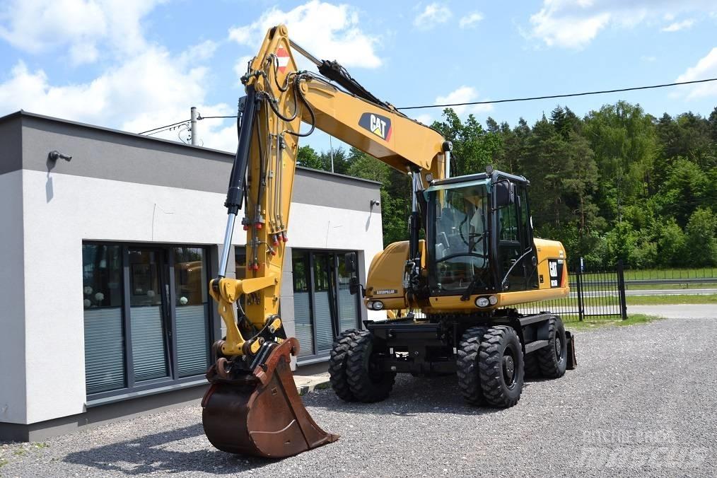 CAT M 316 D حفارات بعجل