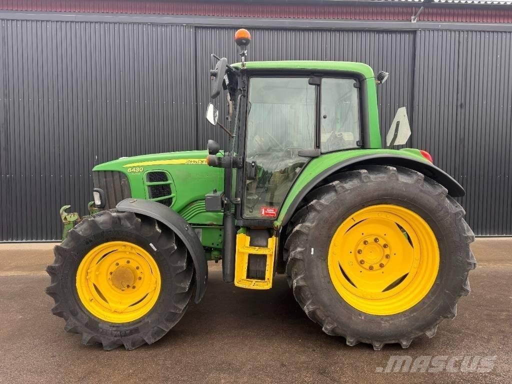 John Deere 6430 الجرارات