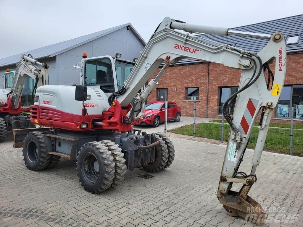 Takeuchi TB295W حفارات بعجل