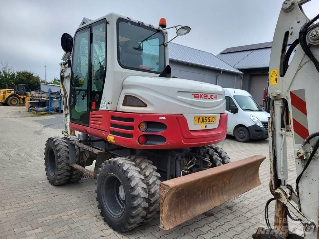 Takeuchi TB295W حفارات بعجل