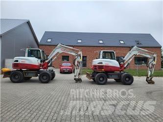 Takeuchi TB295W حفارات بعجل