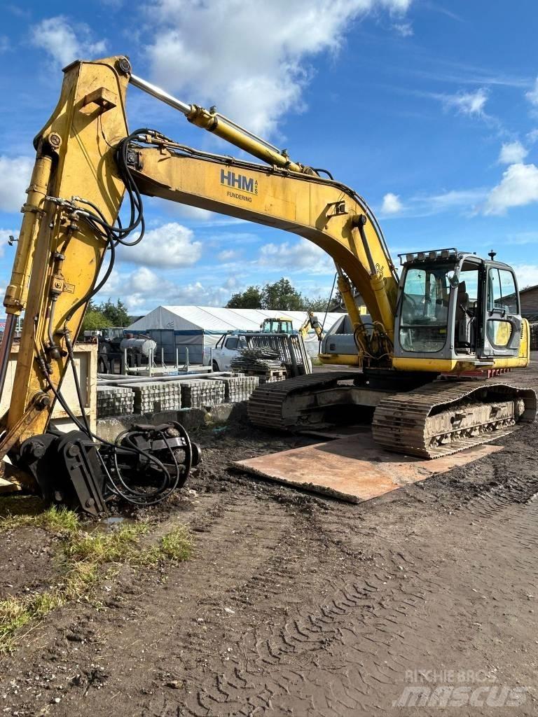 New Holland E 265 حفارات زحافة