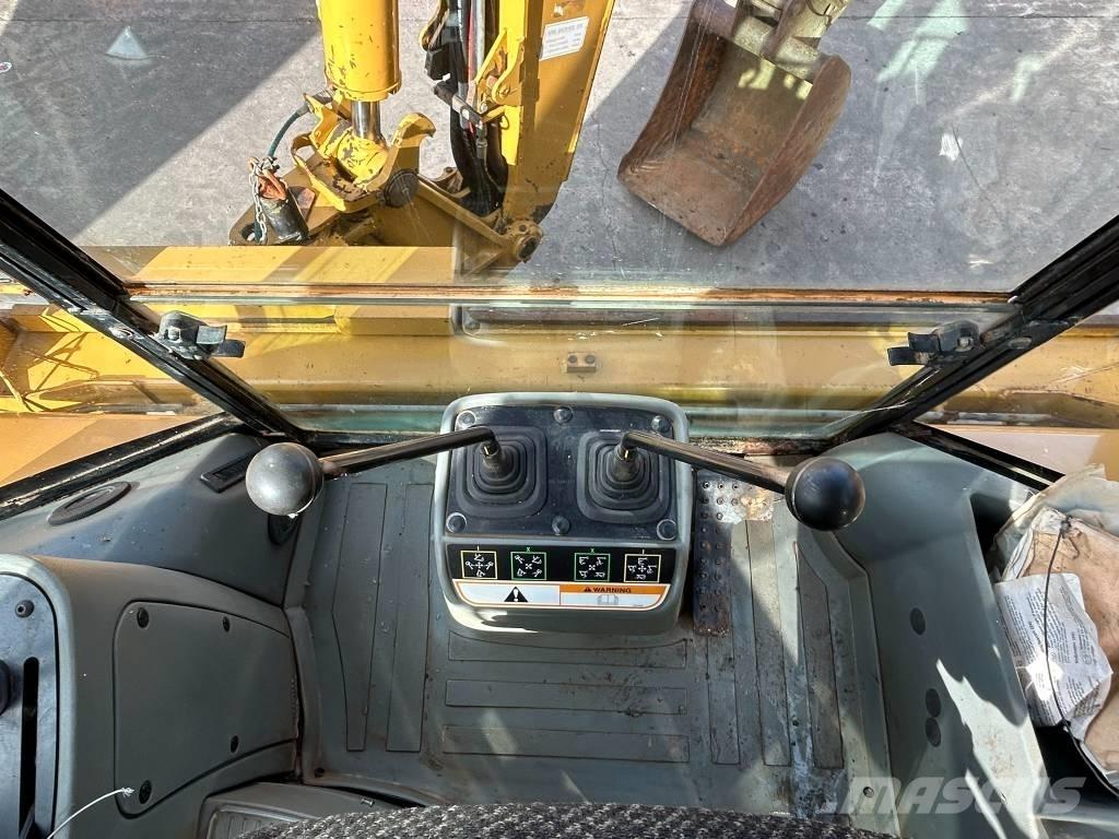 CAT 428 D لوادر ذات جرافات عكسية