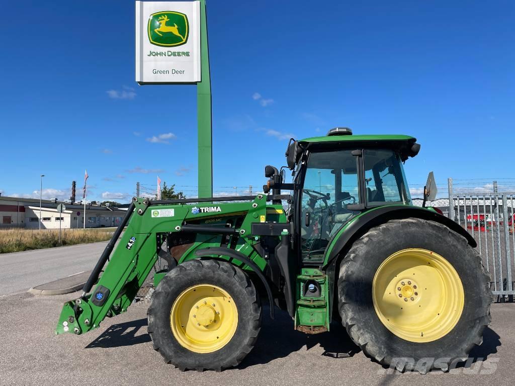 John Deere 6105 MC الجرارات