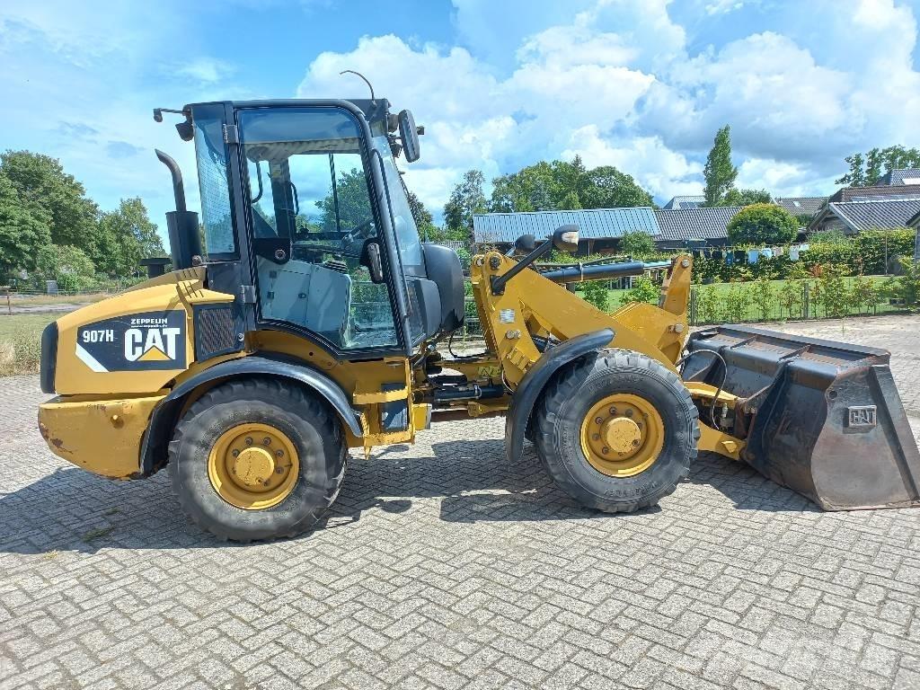 CAT 907 H لوادر بعجل