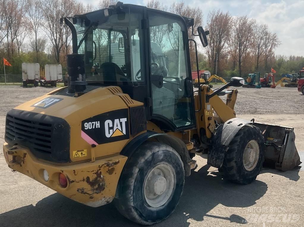 CAT 907 H لوادر بعجل