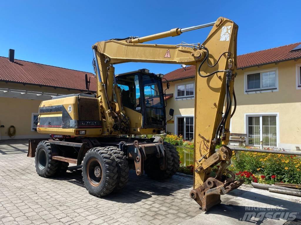 CAT M 312 حفارات بعجل