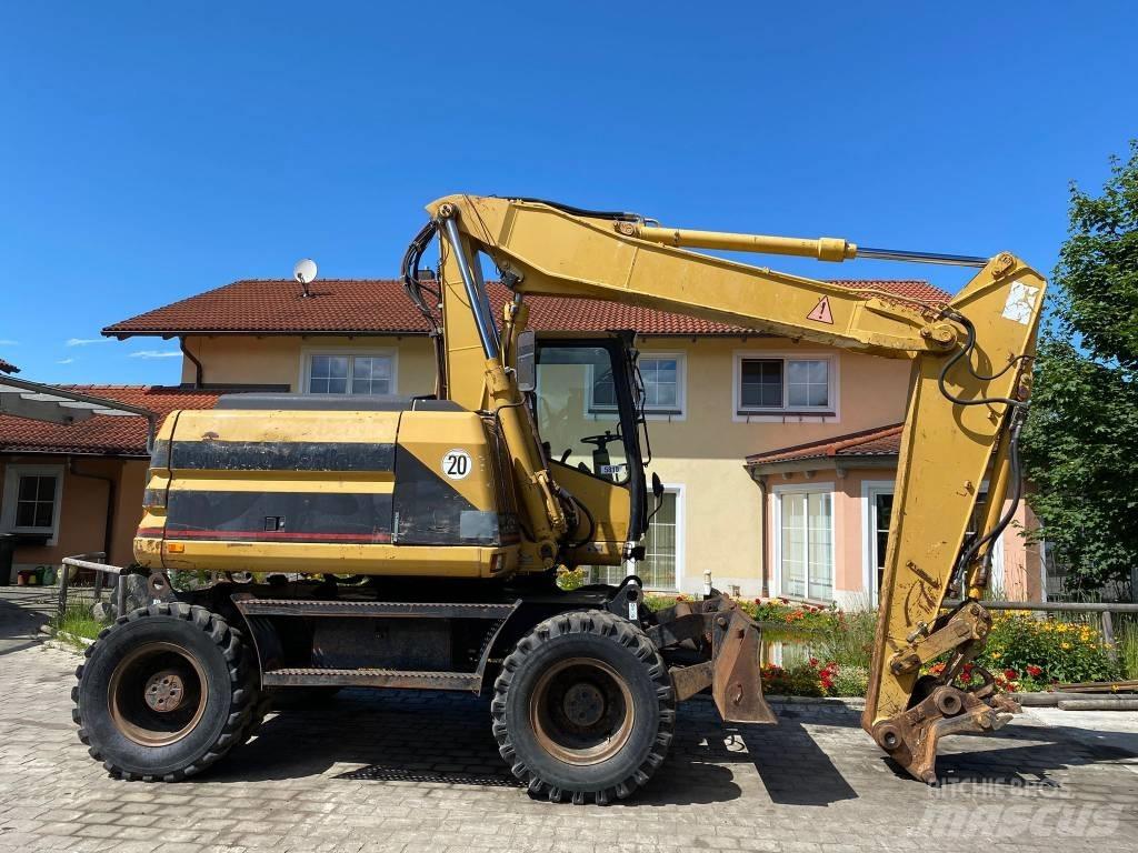 CAT M 312 حفارات بعجل