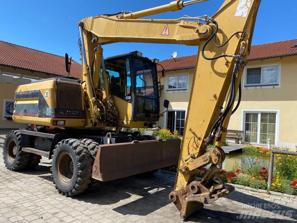 CAT M 312 حفارات بعجل