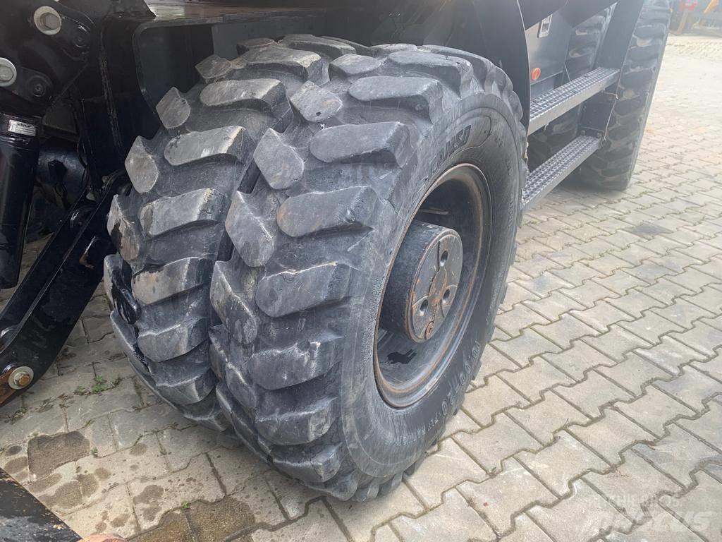 CAT M 318 F حفارات بعجل