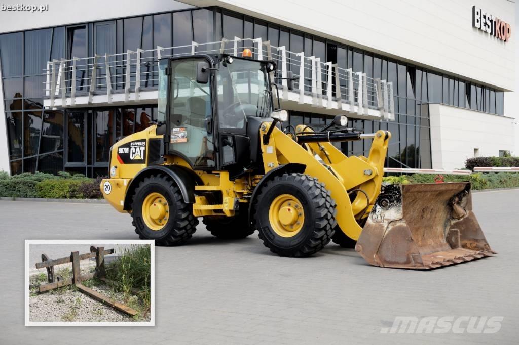 CAT 907 M لوادر بعجل