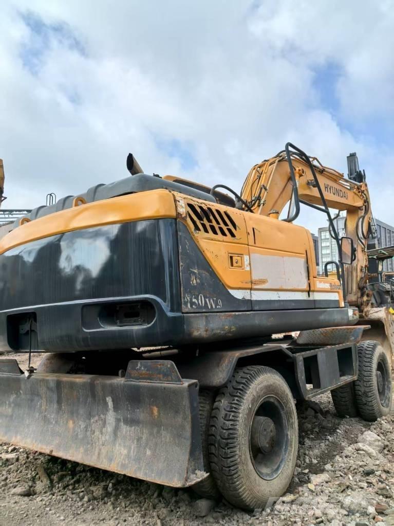 Hyundai R150W-9 حفارات بعجل