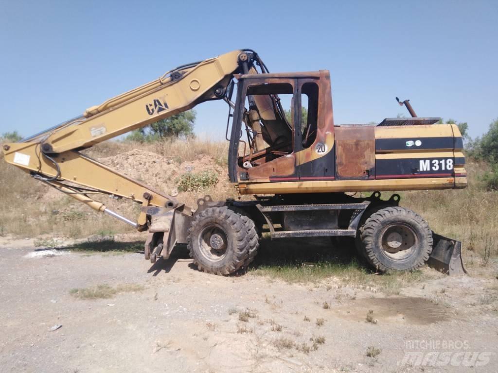 CAT M318 parts M 318 حفارات بعجل
