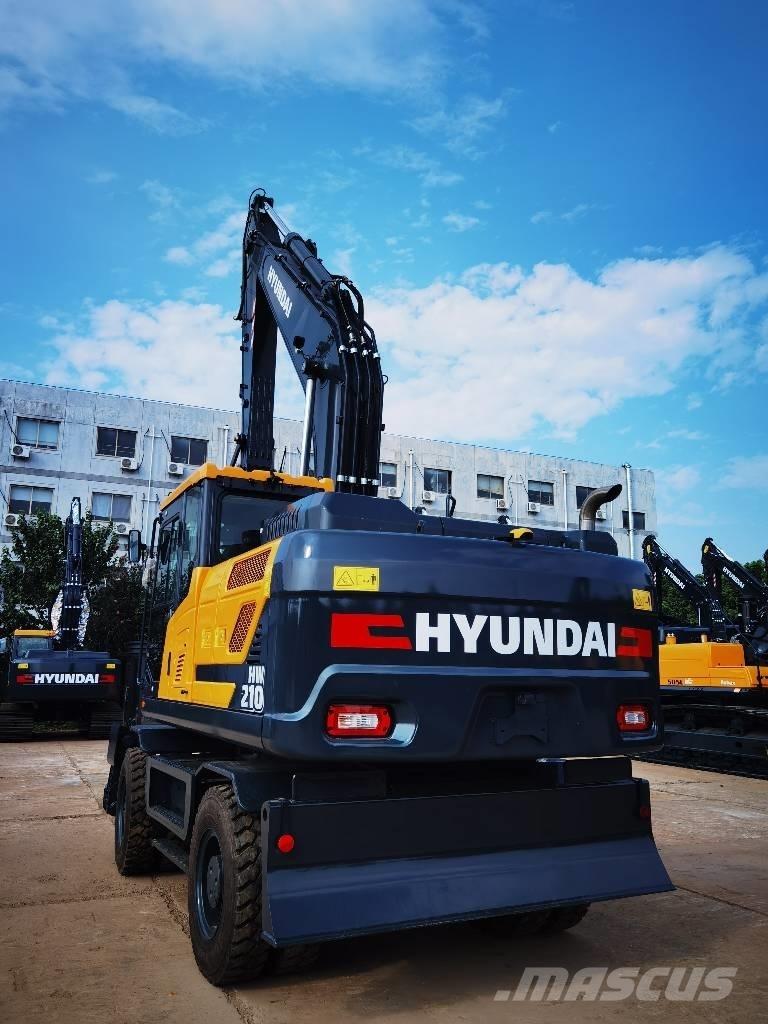 Hyundai 210W-9 حفارات بعجل