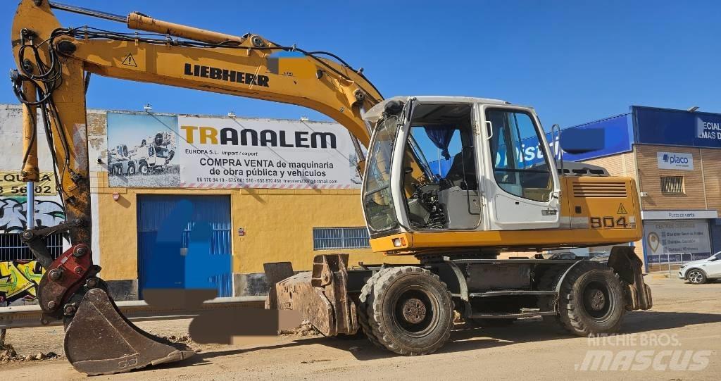 Liebner A904C حفارات بعجل