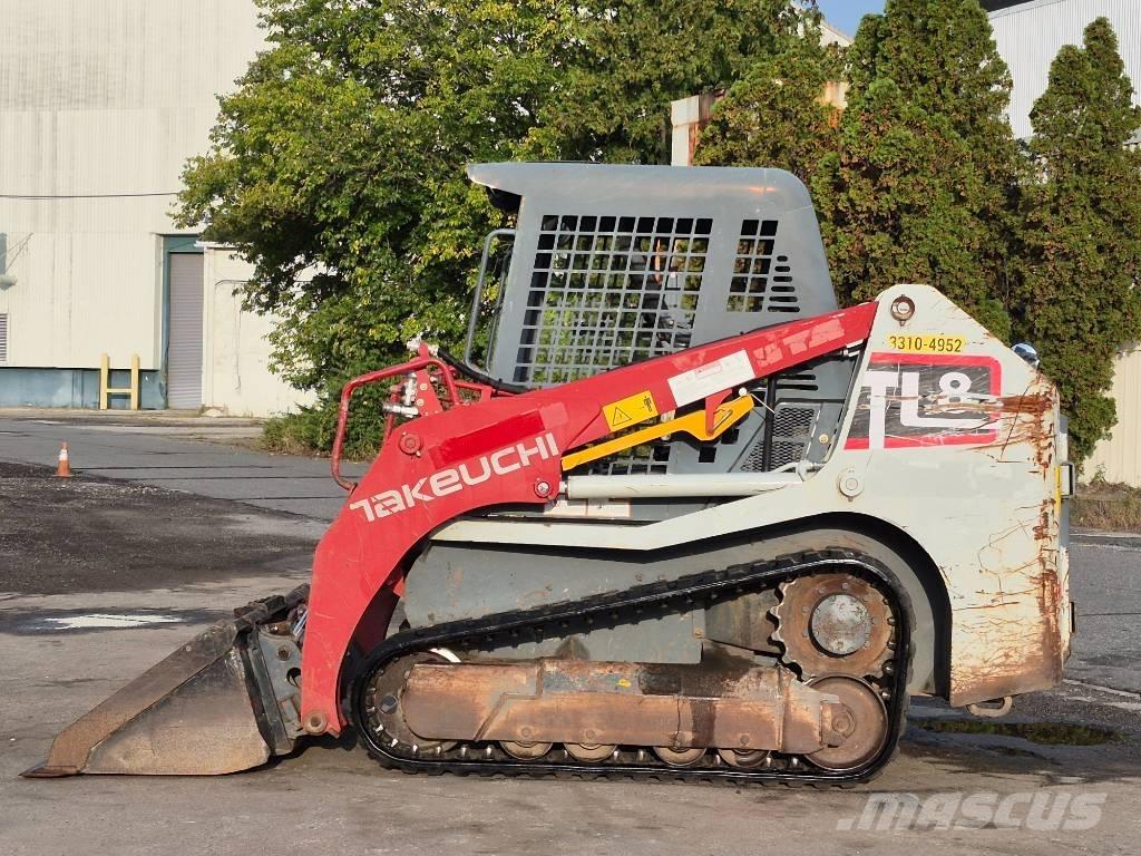 Takeuchi TL 8 لوادر انزلاقية التوجيه