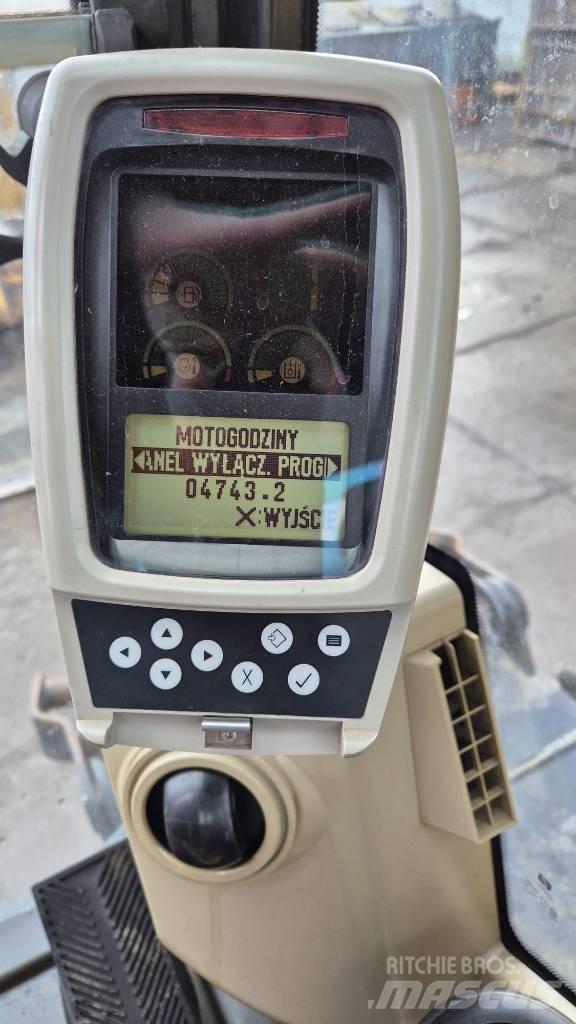 CAT M 315 C حفارات بعجل