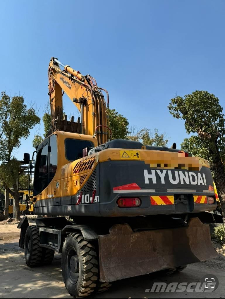 Hyundai 210W-9 حفارات بعجل