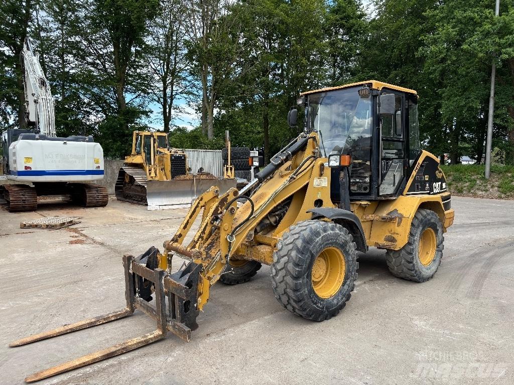 CAT 908 لوادر بعجل