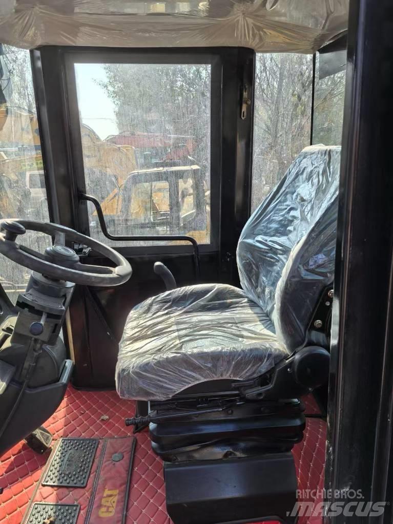 CAT 966H لوادر بعجل