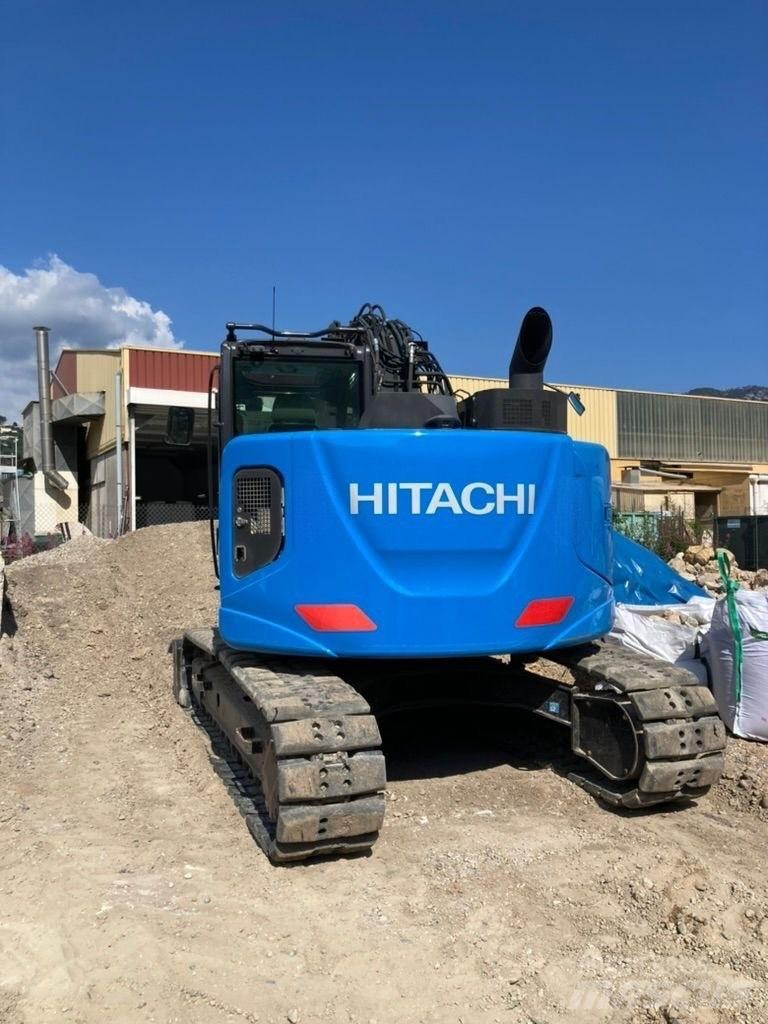 Hitachi ZX 135 US-6 حفارات زحافة