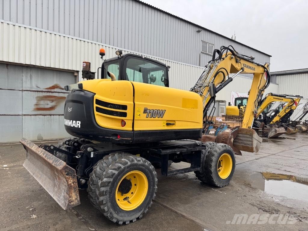 Yanmar B110W (40518) حفارات بعجل