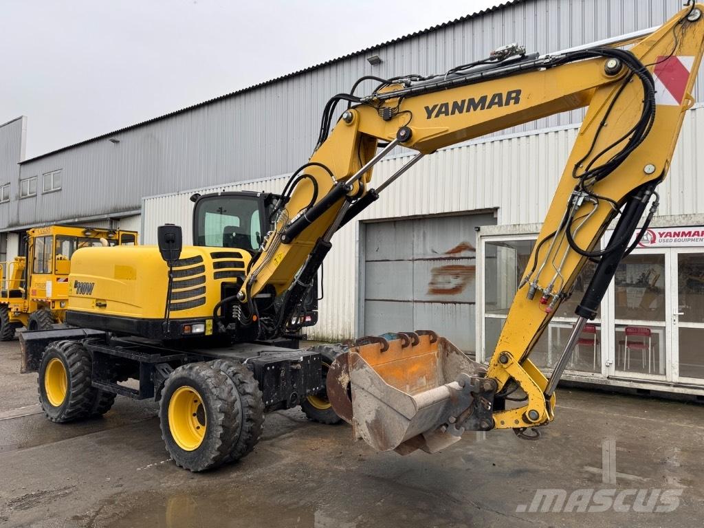 Yanmar B110W (40518) حفارات بعجل