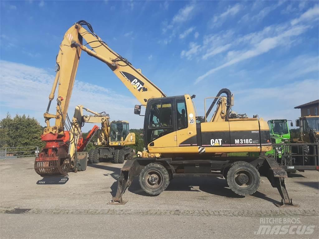 CAT M318C MH حفارات بعجل