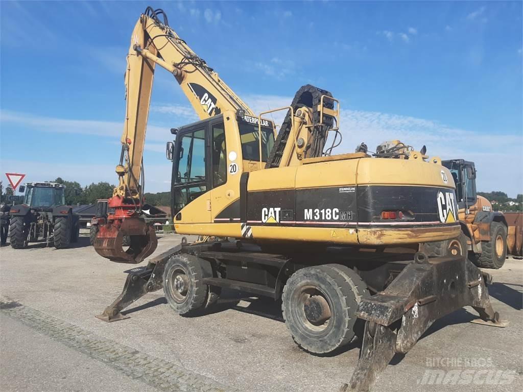 CAT M318C MH حفارات بعجل