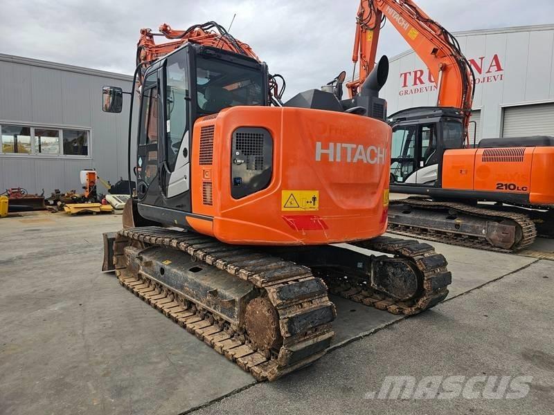 Hitachi ZX 135 US-6 حفارات زحافة