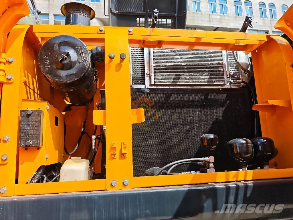 Hyundai 210W-9 حفارات بعجل