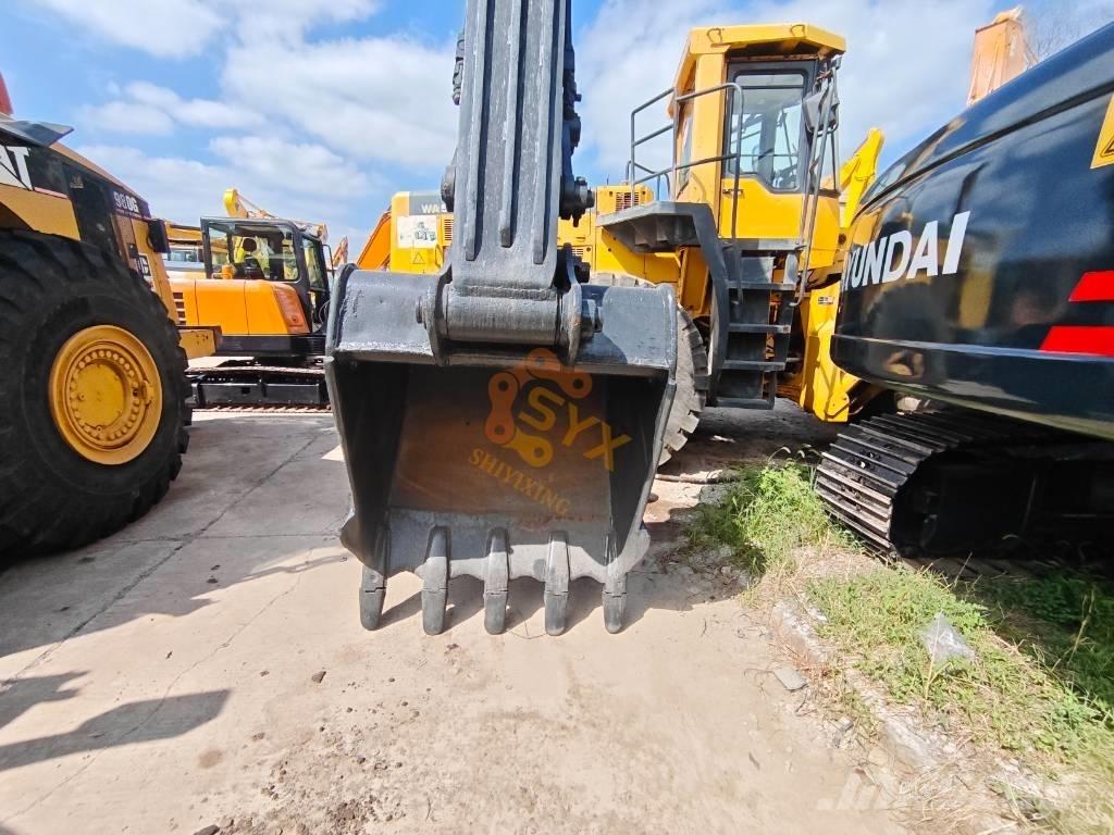 Hyundai 210W-9 حفارات بعجل