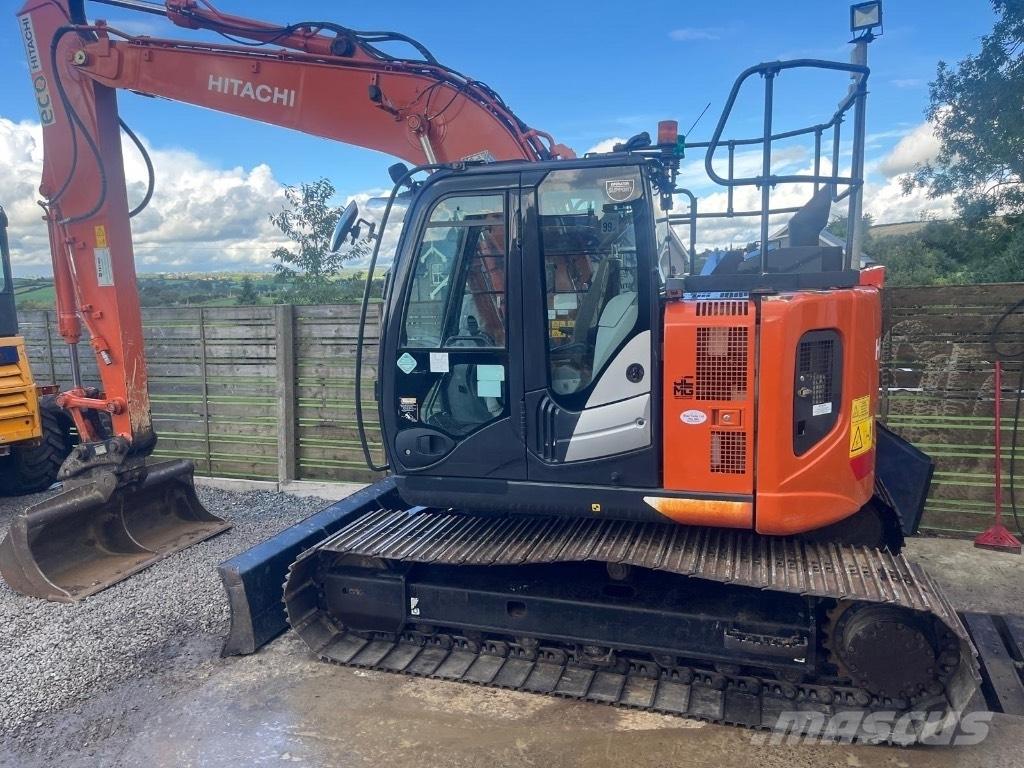 Hitachi ZX 135 US-6 حفارات زحافة
