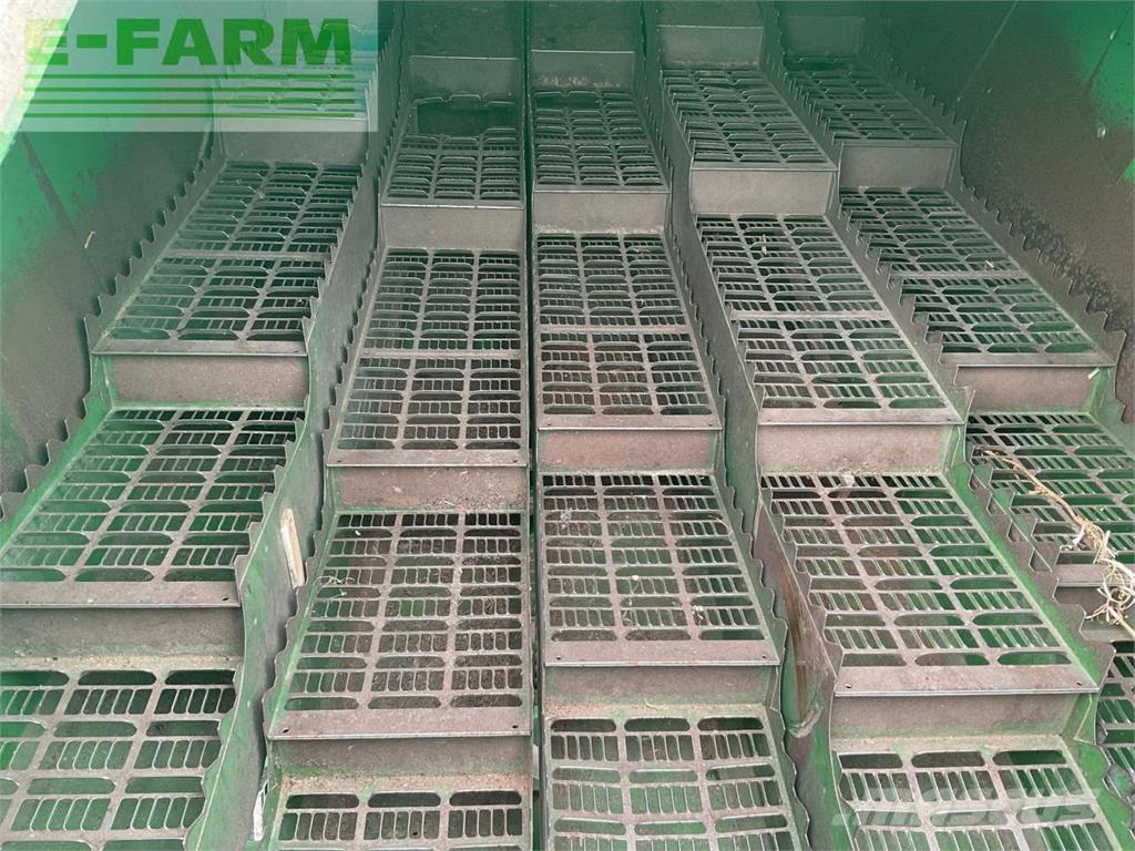 John Deere T560HM حصادات