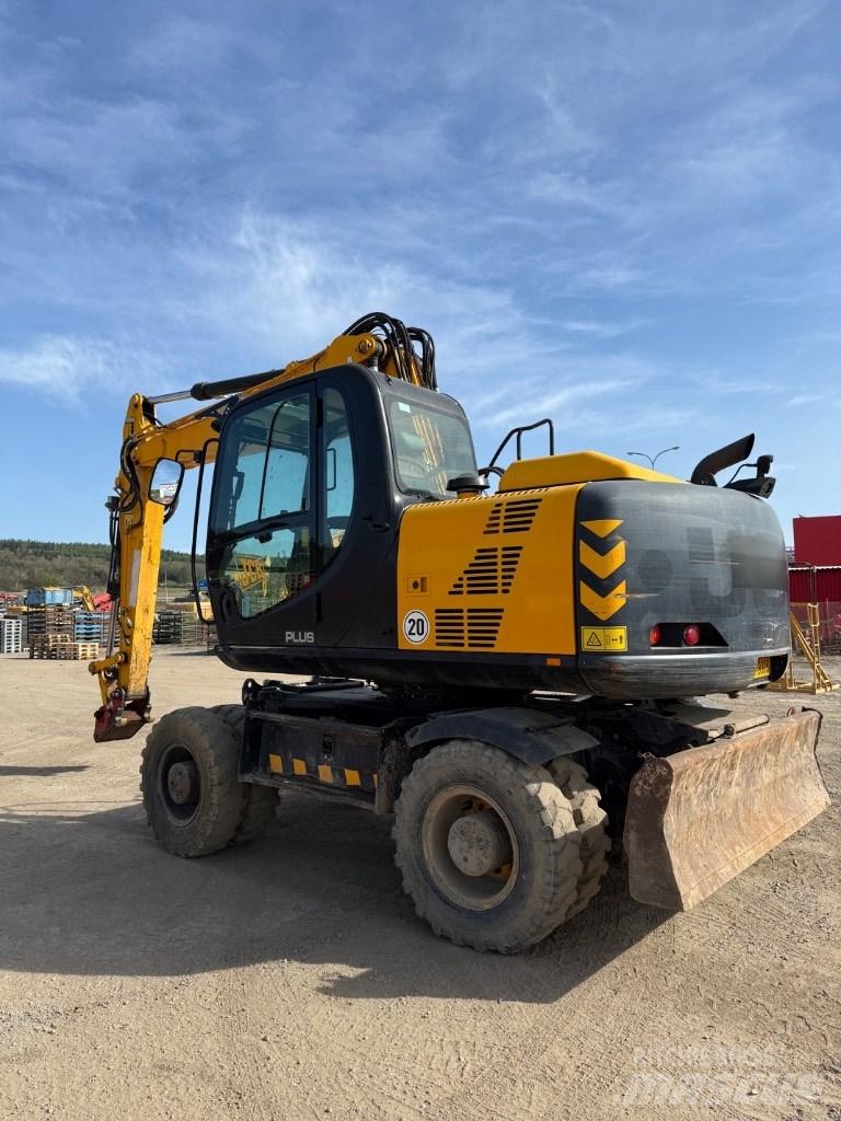 JCB JS 145 W حفارات بعجل