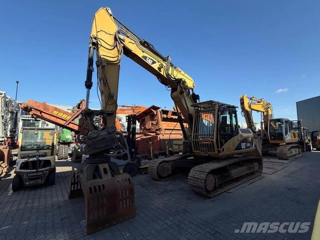 CAT 319D حفارات زحافة