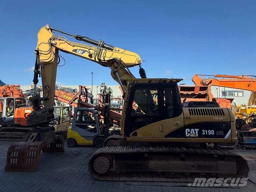CAT 319D حفارات زحافة